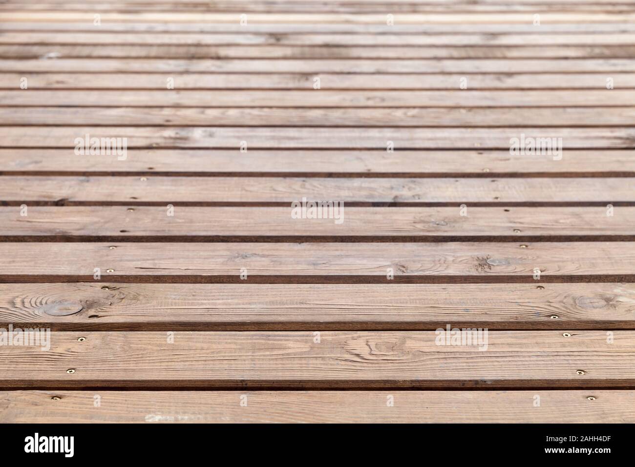 Parquet en bois naturel, fond photo avec soft focus sélectif sur un avant-plan Banque D'Images