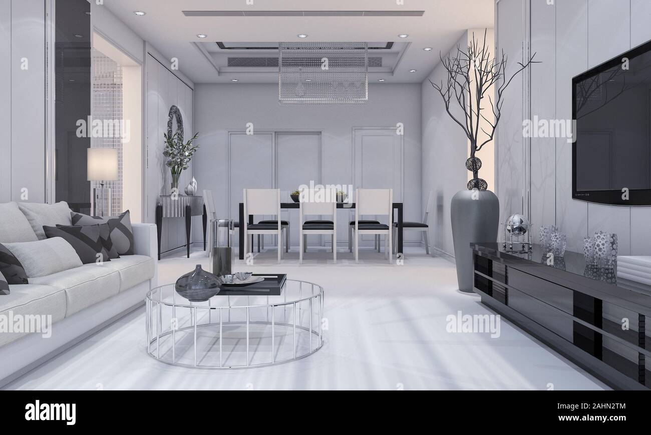 cette salle de séjour et salle à manger de luxe au design moderne et agréable est dotée d''un canapé gris, d''une étagère de télévision et d''une table à manger Banque D'Images