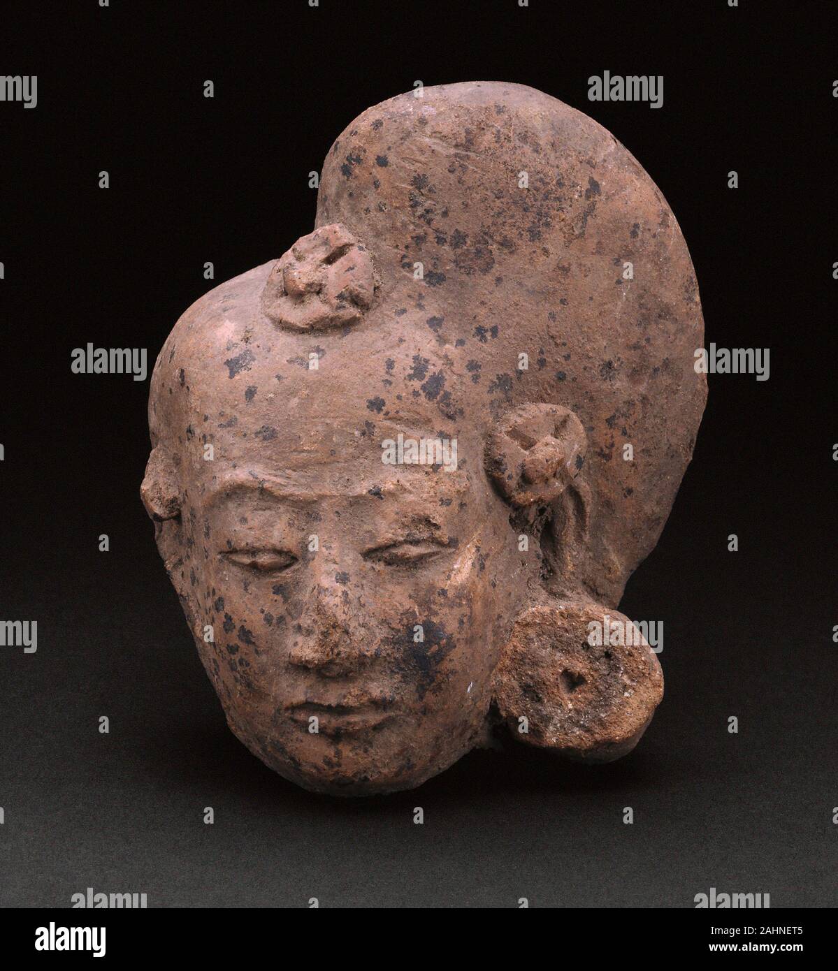 Tête d'une figurine d'une femme. 1301-1500. L'Est de Java. Sols en terre cuite Banque D'Images
