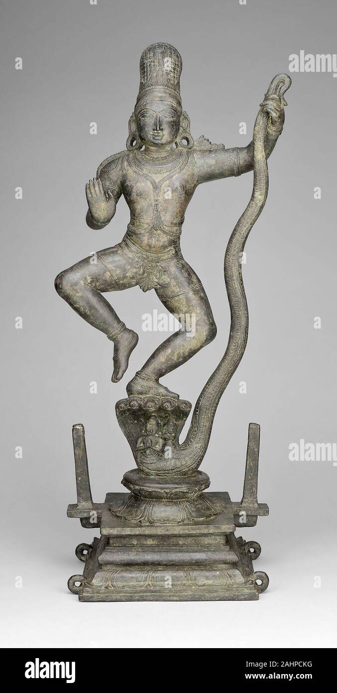 Dieu Krishna dansant sur la tête du démon Serpent Kaliya (Kaliyadamana). 1301-1400. Tamil Nadu. Le Bronze Banque D'Images