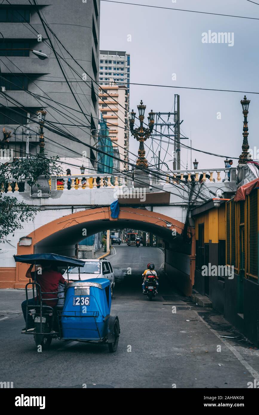 Dans un tricycle, Binondo Manille, Philippines Banque D'Images