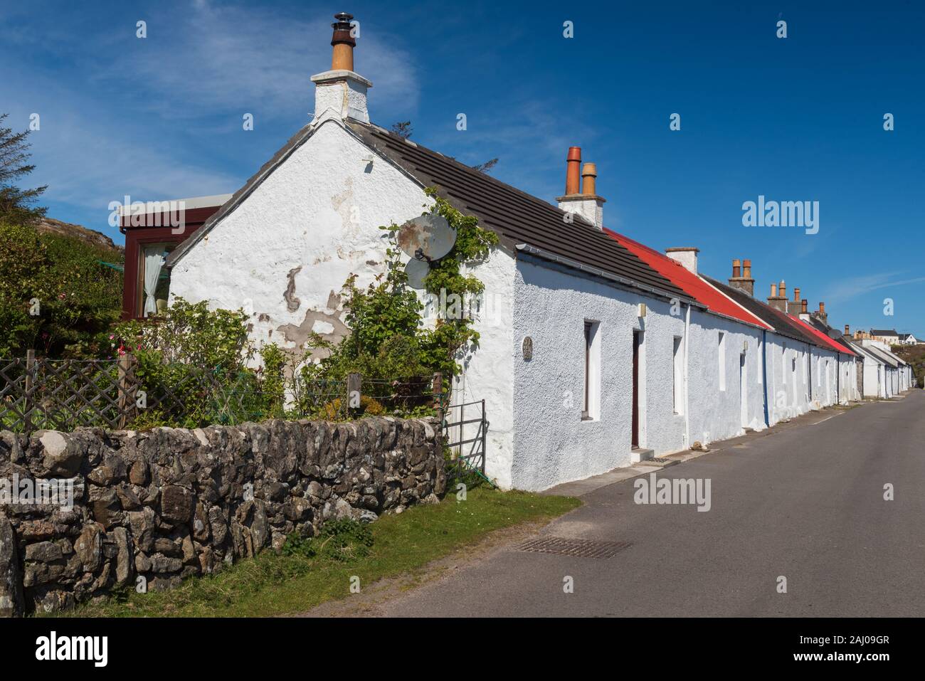Cottages blanchis à Arinagour sur l'île de Coll Banque D'Images