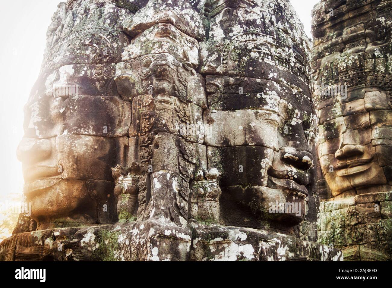 Visages de pierre au temple Bayon, Angkor, Siem Reap, Cambodge. Banque D'Images