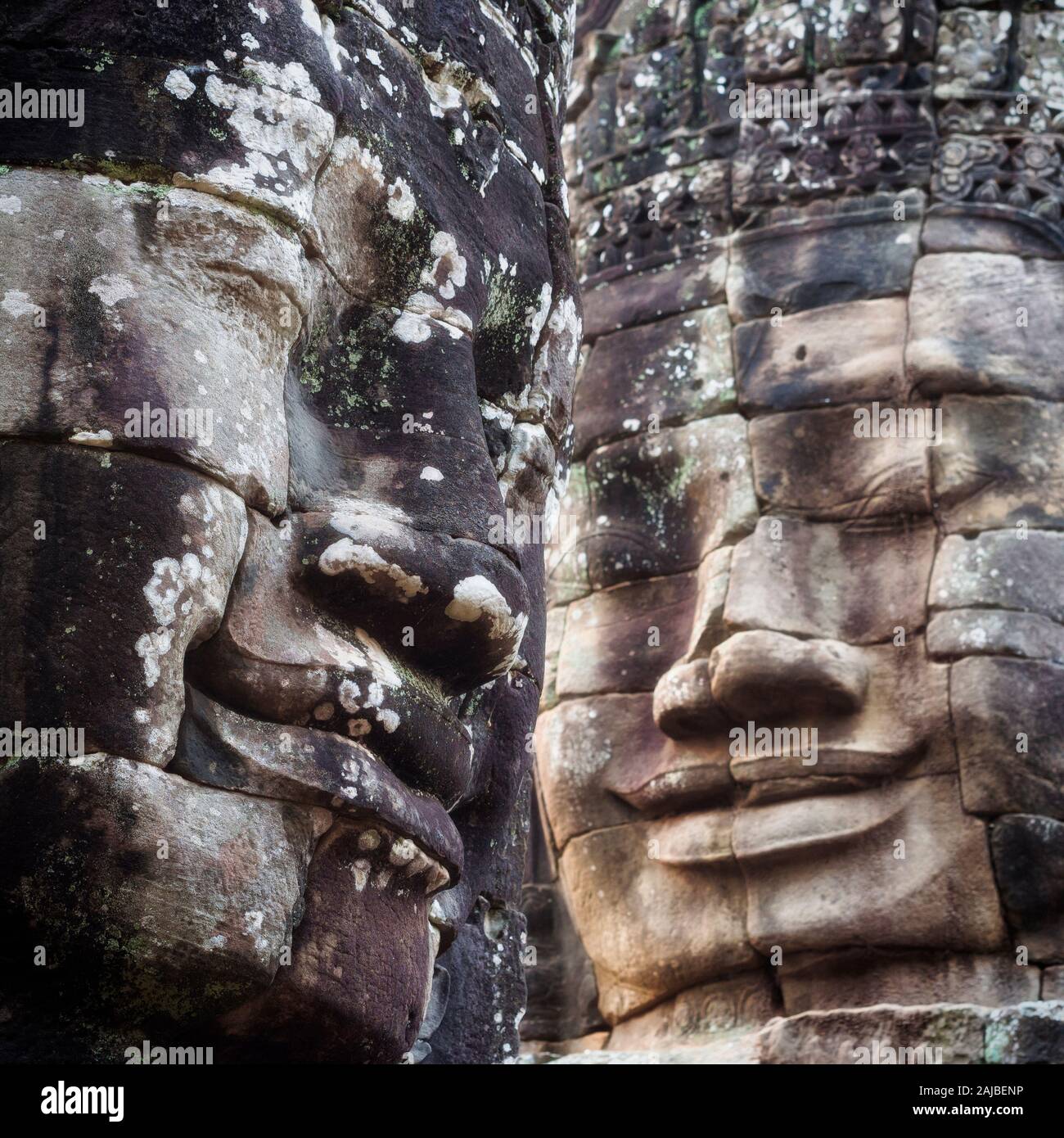 Visages de pierre au temple Bayon à Angkor, Siem Reap, Cambodge. Banque D'Images