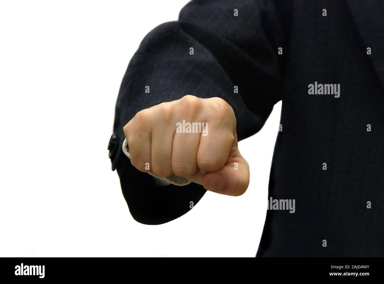 Man in suit isolé sur blanc avec son poing poussé vers l'avant Banque D'Images