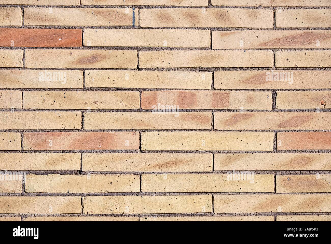 Arrière-plan d'un mur de briques de clinker beige Banque D'Images Arrière-plan d'un mur de briques de clinker beige Banque D'Images