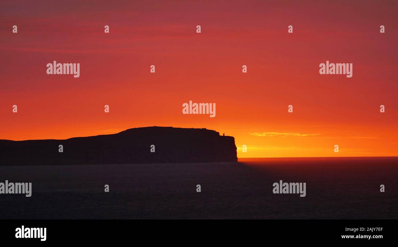Coucher de soleil sur Dunnet Head dans le Caithness, Écosse, Royaume-Uni, prise en Septembre Banque D'Images