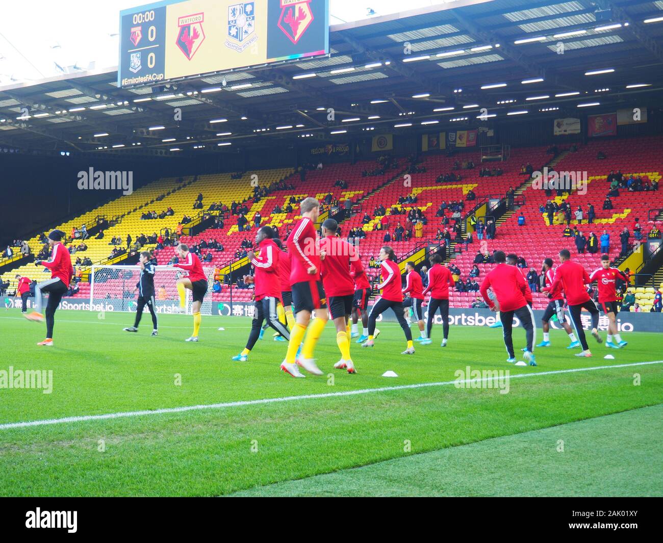 Watford joueurs s'échauffer avant de la FA Cup Match vs Tranmere Rovers Banque D'Images