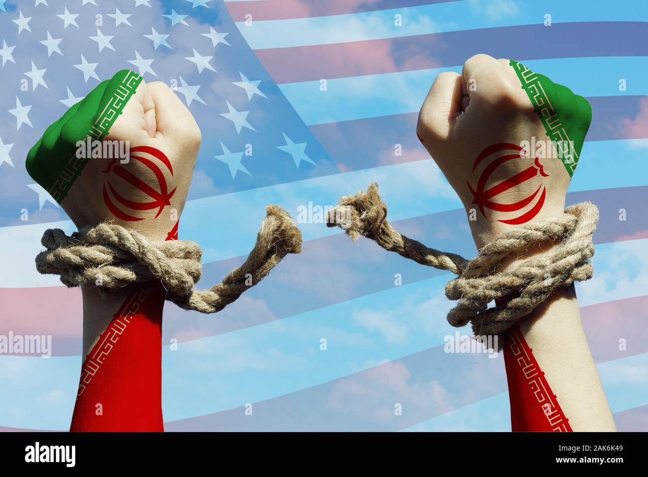 Les mains avec des cordes déchirées. La conception des rapports entre l'Amérique et l'Iran Banque D'Images