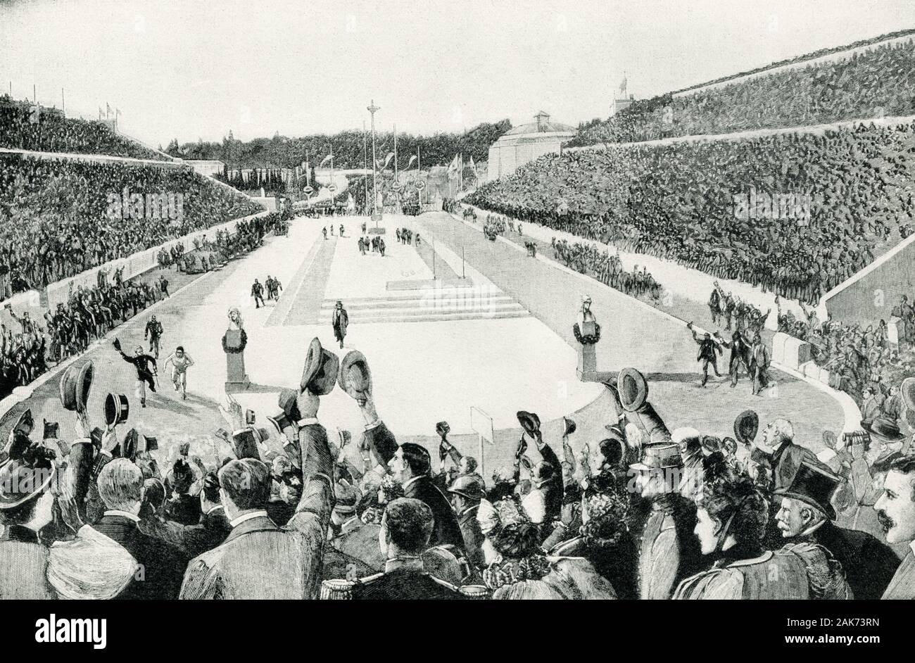 Cette illustration remonte au début des années 1900 et montre une victoire américaine lors de la renaissance des Jeux Olympiques de 1896 en Grèce. La track-et-programme de terrain à Athènes a été dominé par les athlètes de l'USA, qui allait remporter 9 des 12 événements. Et le 6 avril 1896, l'Américain James Connolly a obtenu la distinction d'être le tout premier champion olympique de l'ère moderne, comme il l'a décroché le titre de triple saut. Charles Pierre de Frédy, baron de Coubertin (mort en 1937), également connu sous le nom de Pierre de Coubertin et le Baron de Coubertin a été un éducateur et historien français. Il était aussi le fondateur de Banque D'Images