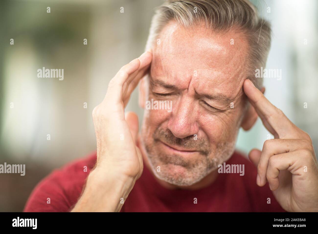 Man having a headache stock photo Banque D'Images