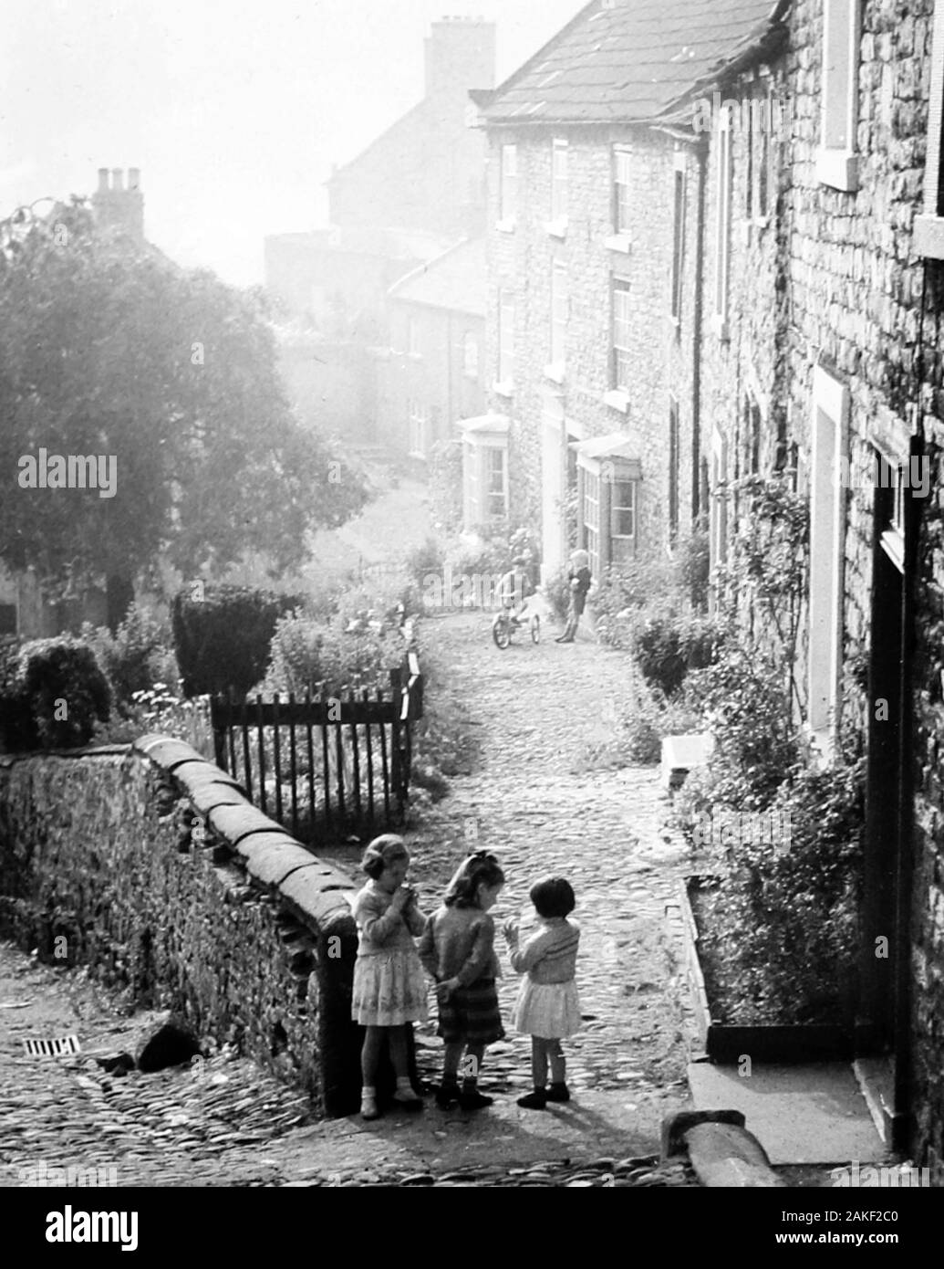 Enfants jouant dans Richmond, Yorkshire au 1940/50s Banque D'Images