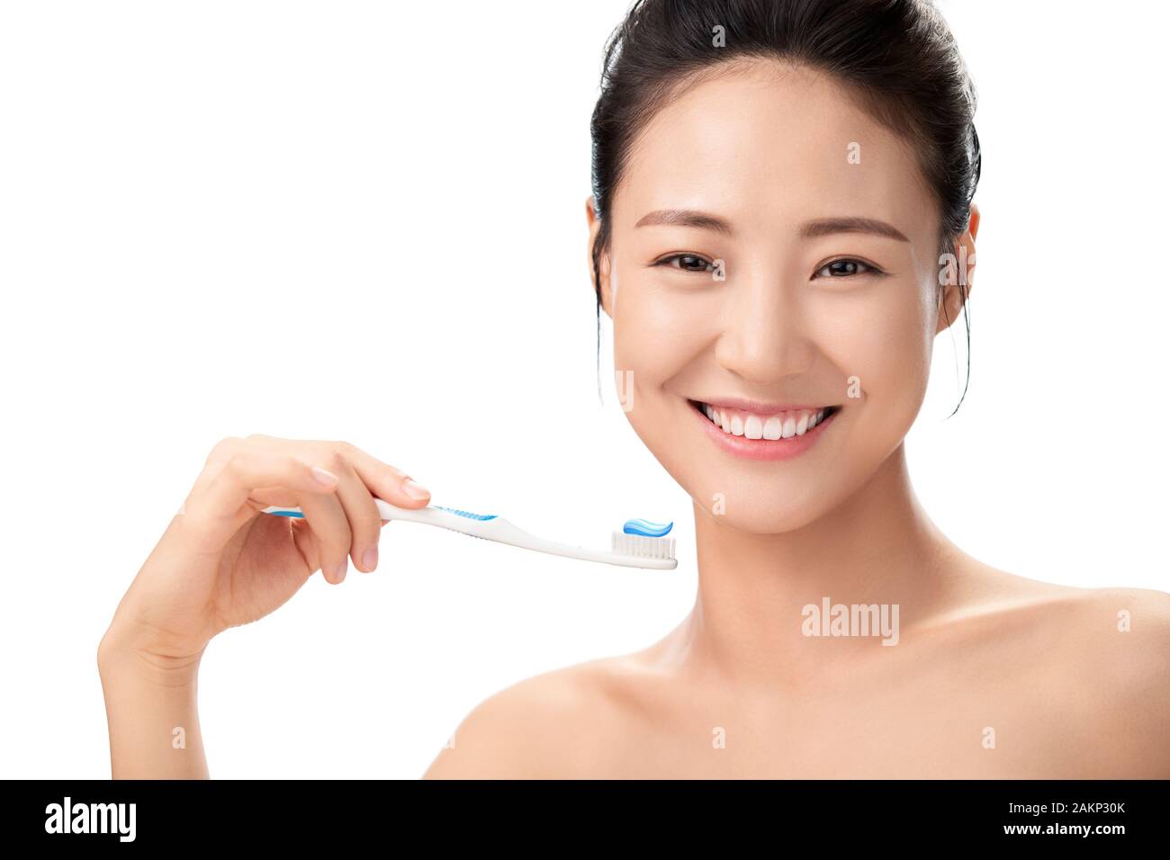 Les jeunes femmes de se brosser les dents Banque D'Images