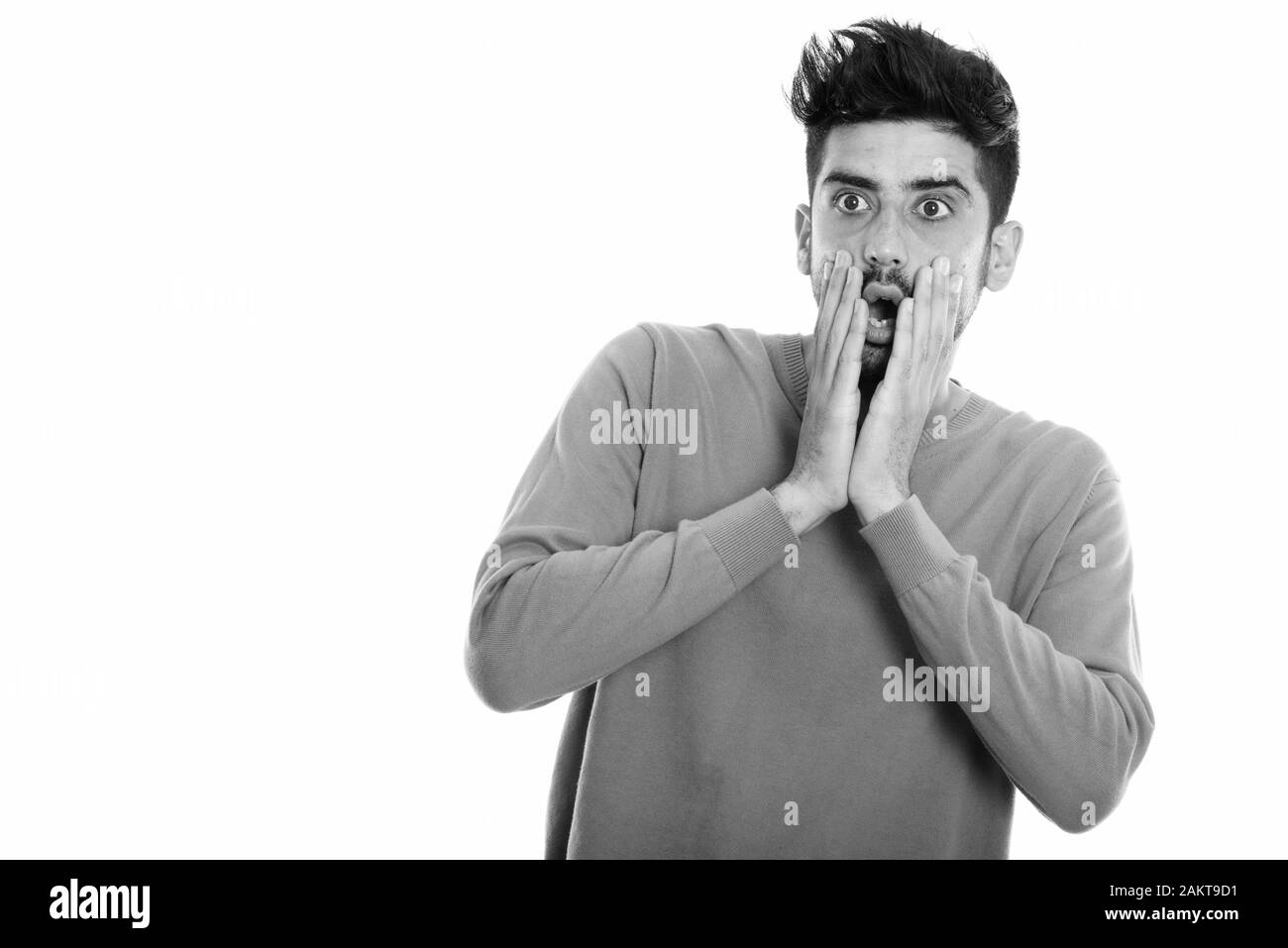 Peur de l'homme à la Perse surpris avec les deux mains sur le visage Banque D'Images