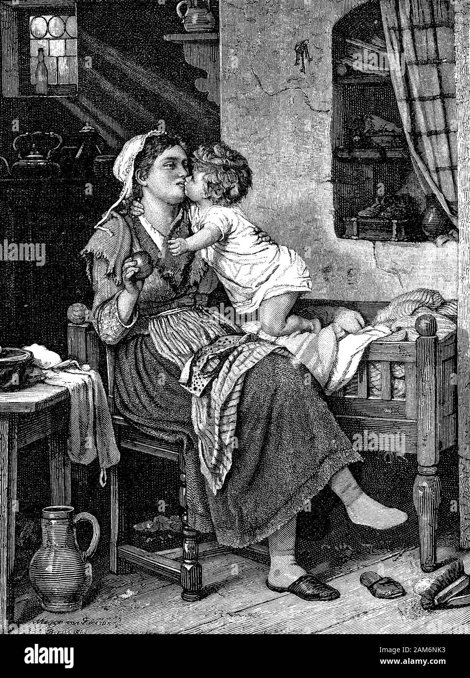 Avant qu'un baiser ! Mère demande à son enfant pour un baiser avant de lui donner une pomme. Jolie scène familiale accueillante dans une maison rurale. Banque D'Images