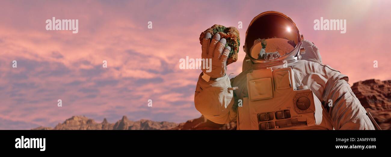 La vie sur la planète Mars, l'astronaute découvre la vie bactérienne à la surface d'un rocher Banque D'Images