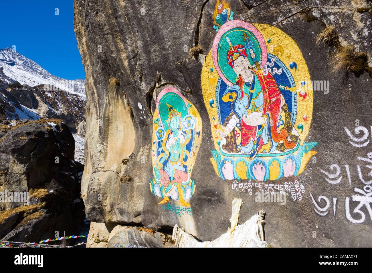 Peintures religieuses bouddhistes sur un rocher, Népal Banque D'Images