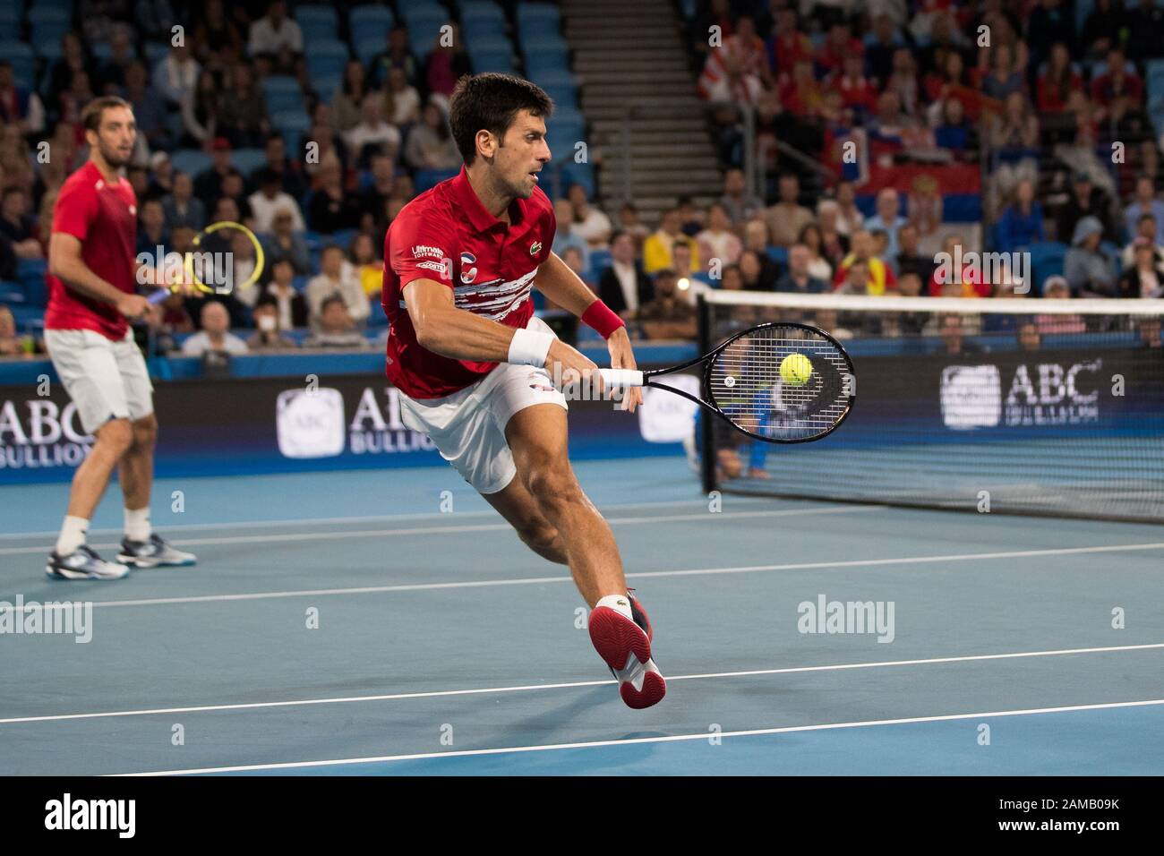 Novak Djokovic de Serbie joue un coup de feu dans les doubles lors de la finale de la coupe ATP 2020 à la Ken Rosewall Arena, Sydney, Australie, le 12 janvier 2020. Photo De Peter Dovgan. Banque D'Images