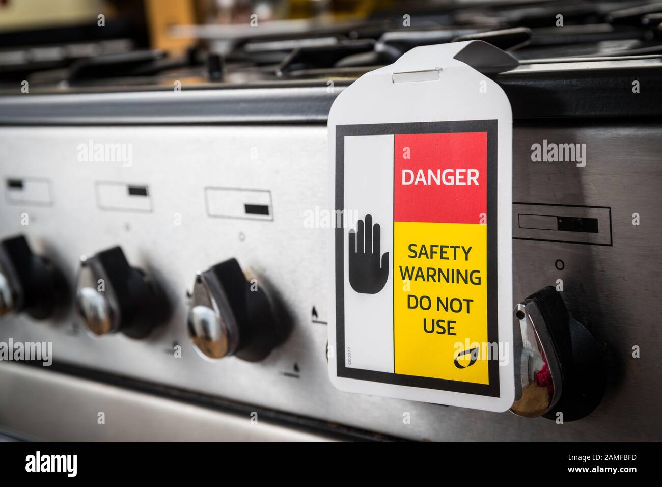 Signe d'avertissement de sécurité des gaz sur un cuiseur à gaz défectueux Banque D'Images