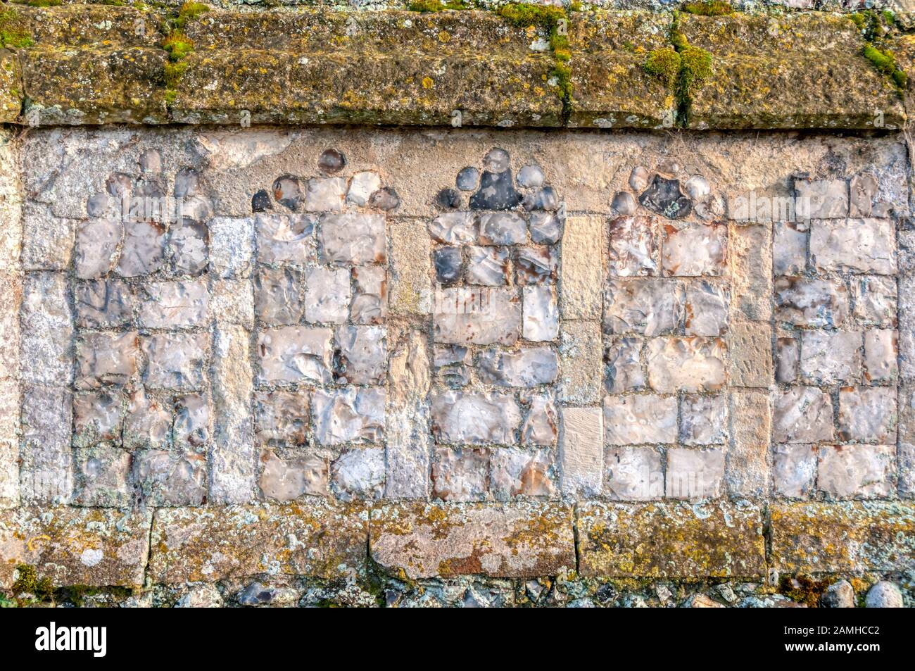 Fint flushwork carré dans l'église paroissiale du XVe siècle de St Margaret à Felbrigg à Norfolk. Banque D'Images