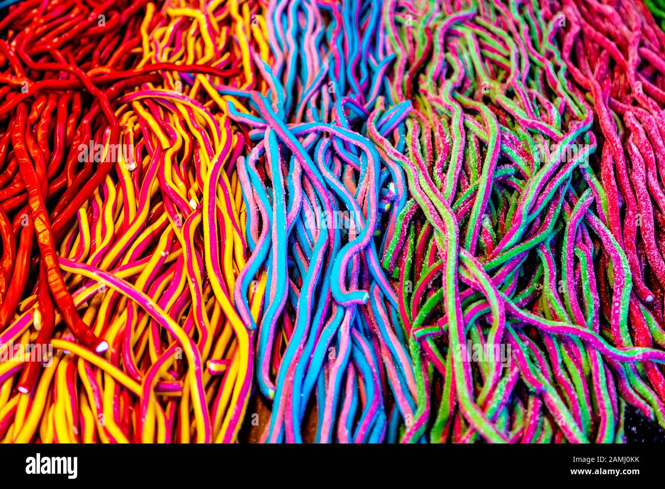 Chewy candy string gelée colorée, Noël par le marché de la rivière à London Bridge, London, UK Banque D'Images