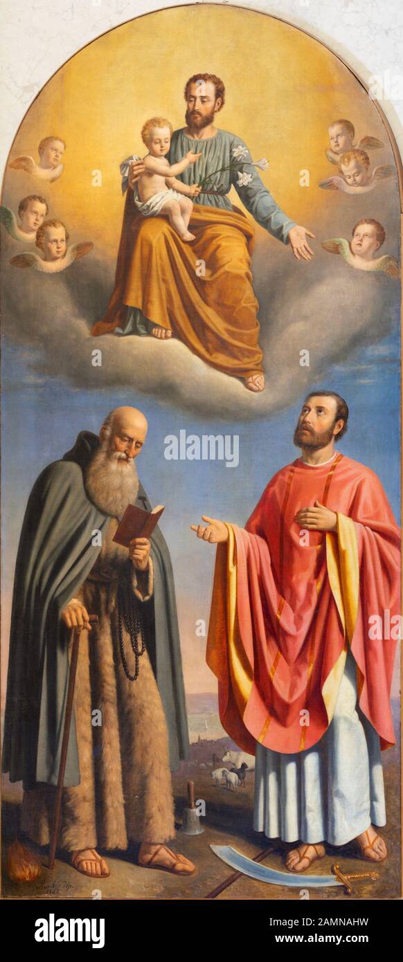 Malcesine, ITALIE - 13 JUIN 2019: La peinture de Saint Joseph, Saint Anthony l'abbé et Saint Valentin dans l'église Chiesa di Santo Stefano. Banque D'Images