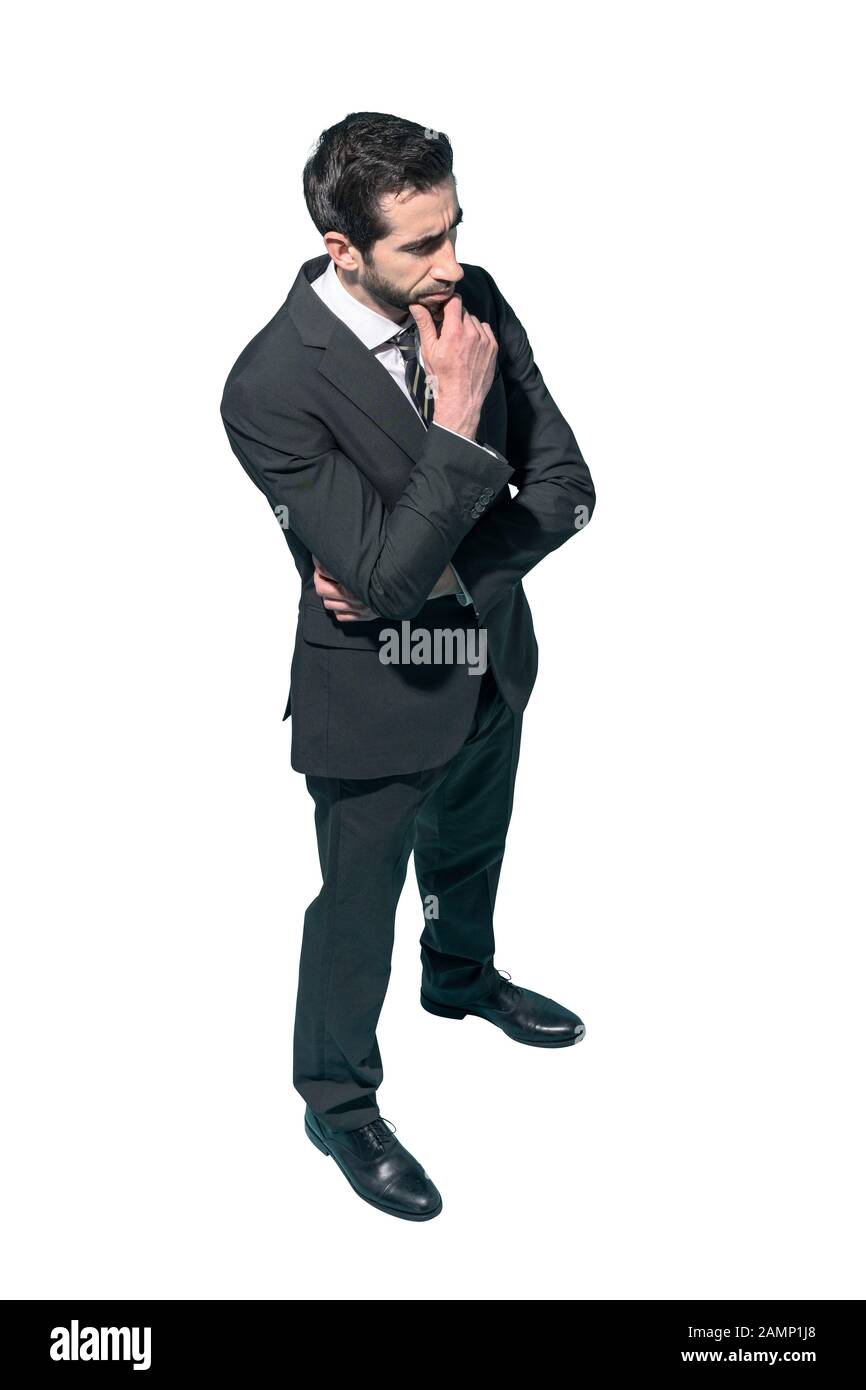 Homme d'affaires confiant posant avec la main sur le menton, fond blanc Banque D'Images Homme d'affaires confiant posant avec la main sur le menton, fond blanc Banque D'Images