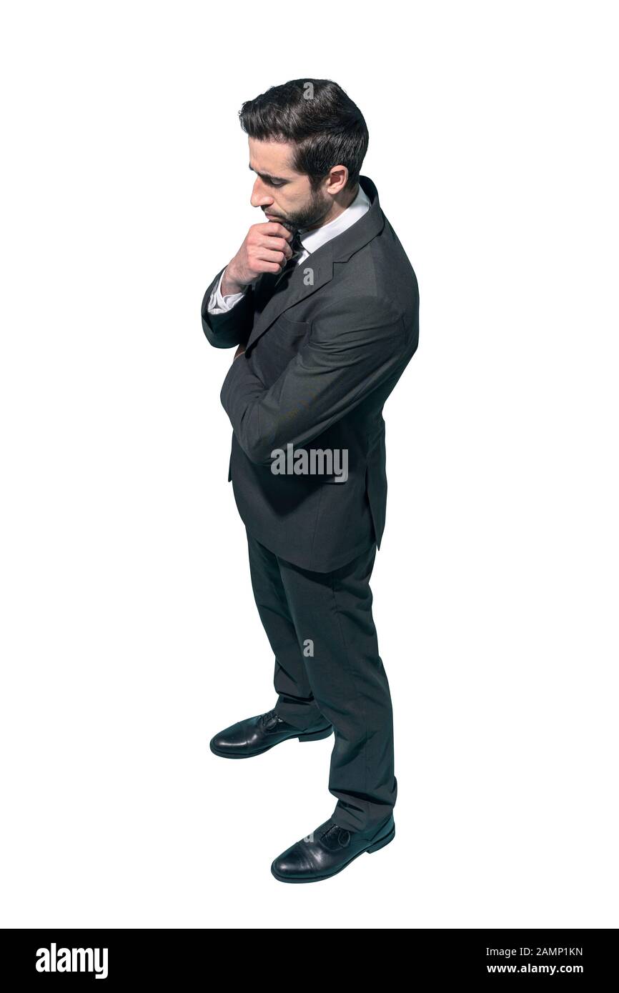Homme d'affaires confiant posant avec la main sur le menton, fond blanc Banque D'Images Homme d'affaires confiant posant avec la main sur le menton, fond blanc Banque D'Images