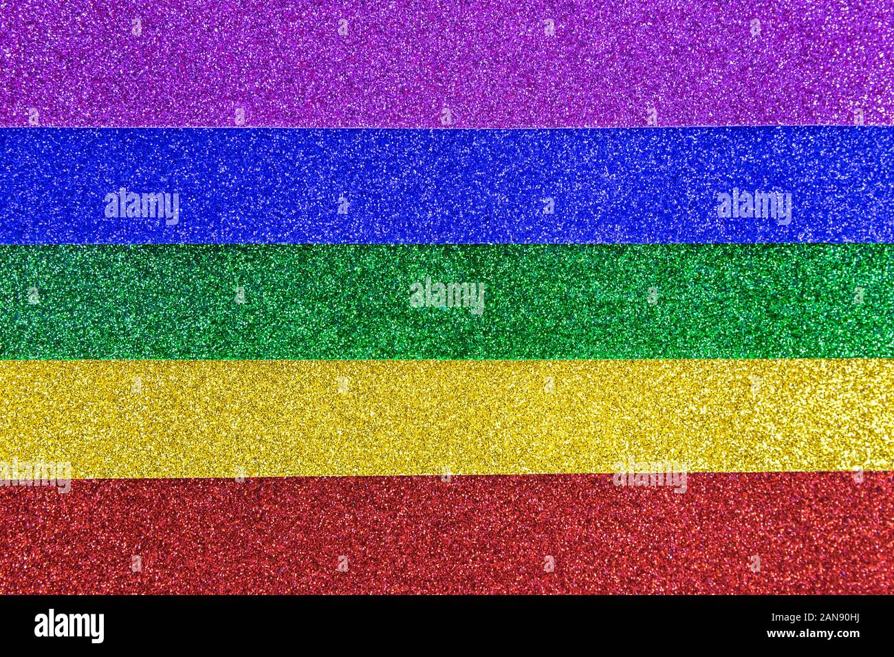 Vue rapprochée d'autocollants Film glitter multicolore avec finition effet arc-en-ciel. Banque D'Images