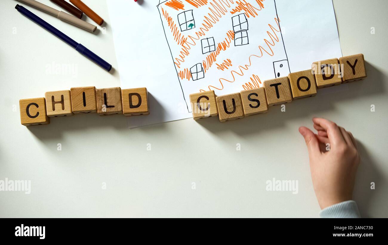 La garde de l'enfant mettre une phrase sur house photo, l'adoption et la charité concept Banque D'Images