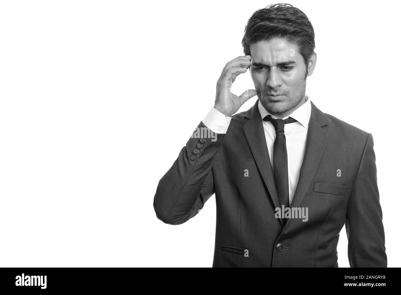 Jeune homme a souligné en Perse à avoir des maux de tête Banque D'Images