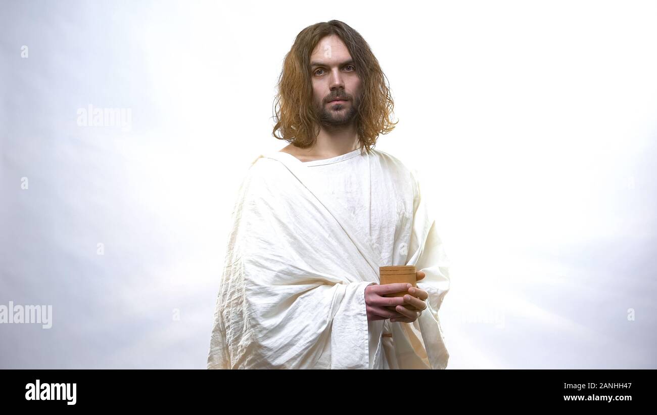 Bon Jésus, coupe en bois holding concept religieux pour abreuver la soif Banque D'Images