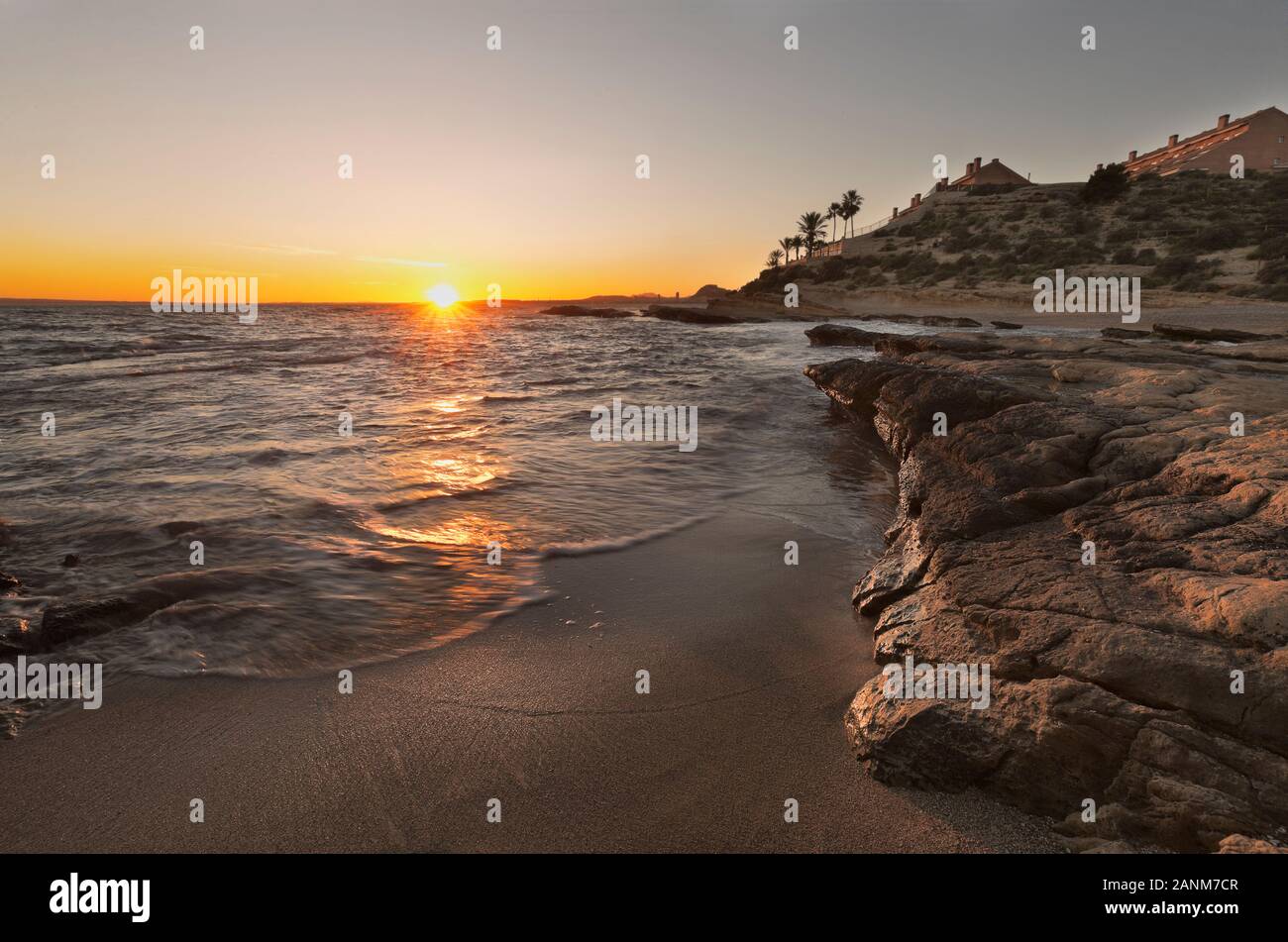 Coucher de soleil sur le Cabo de las Huertas, Alicante, Communauté Valencienne, Espagne. Banque D'Images