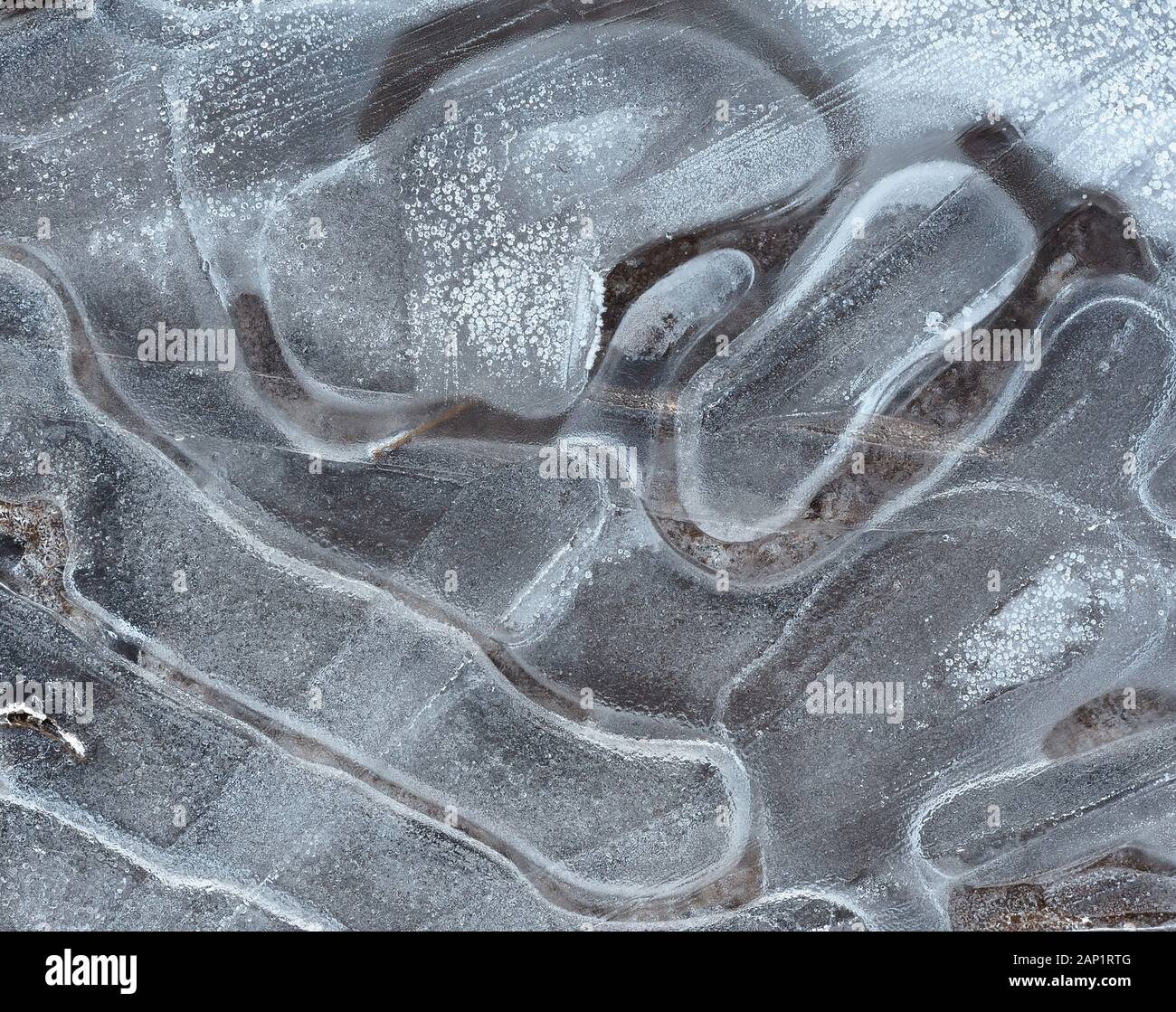 Image abstraite de forme de fissure dans les flaques. Banque D'Images