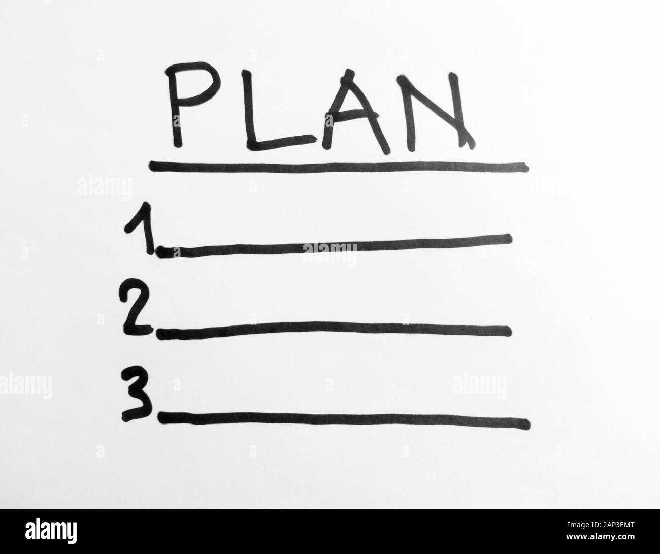 Des mots écrits à la main - plan - marqueur noir sur papier blanc Banque D'Images