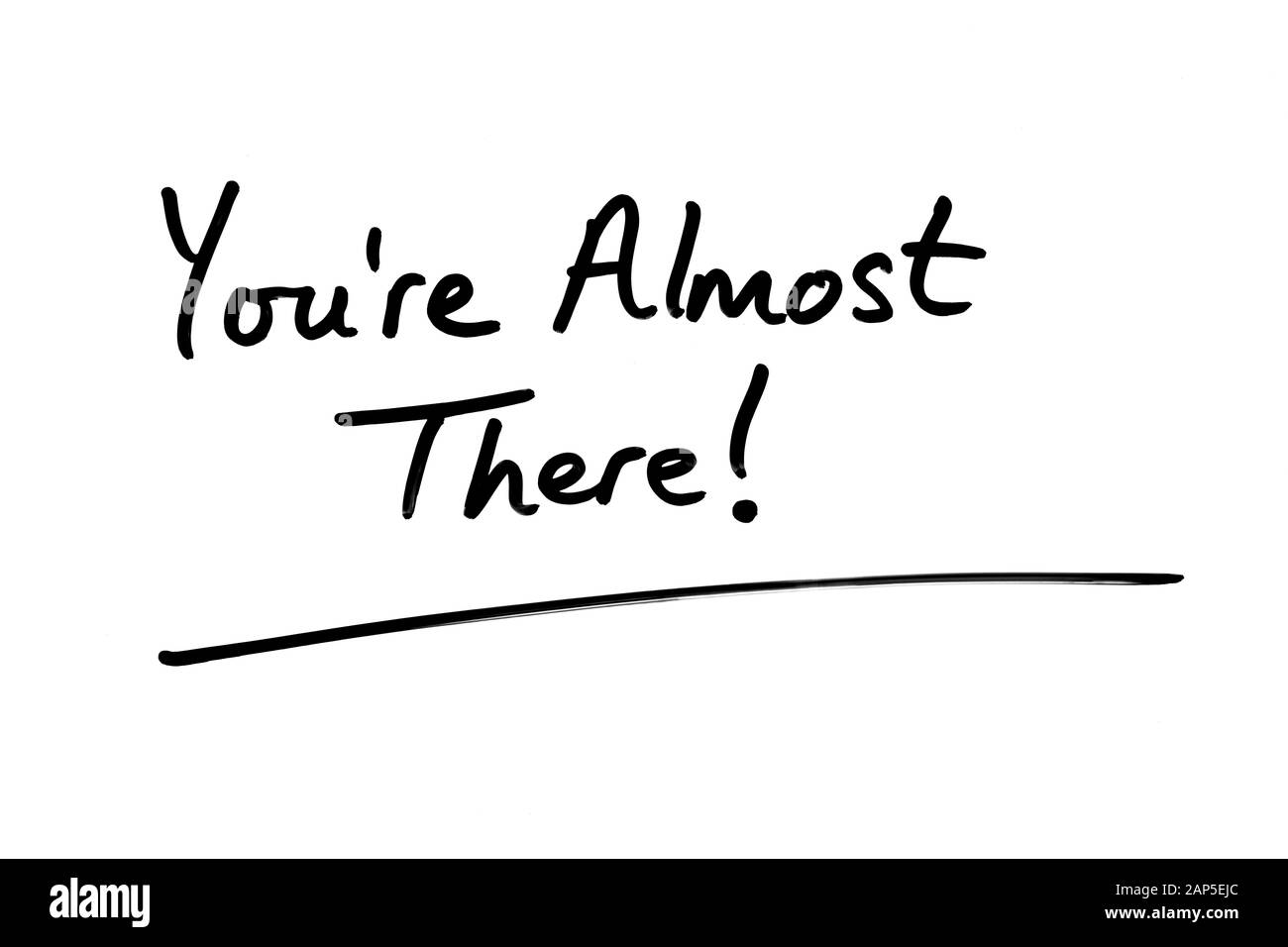 Vous y êtes presque ! À la main sur un fond blanc. Banque D'Images