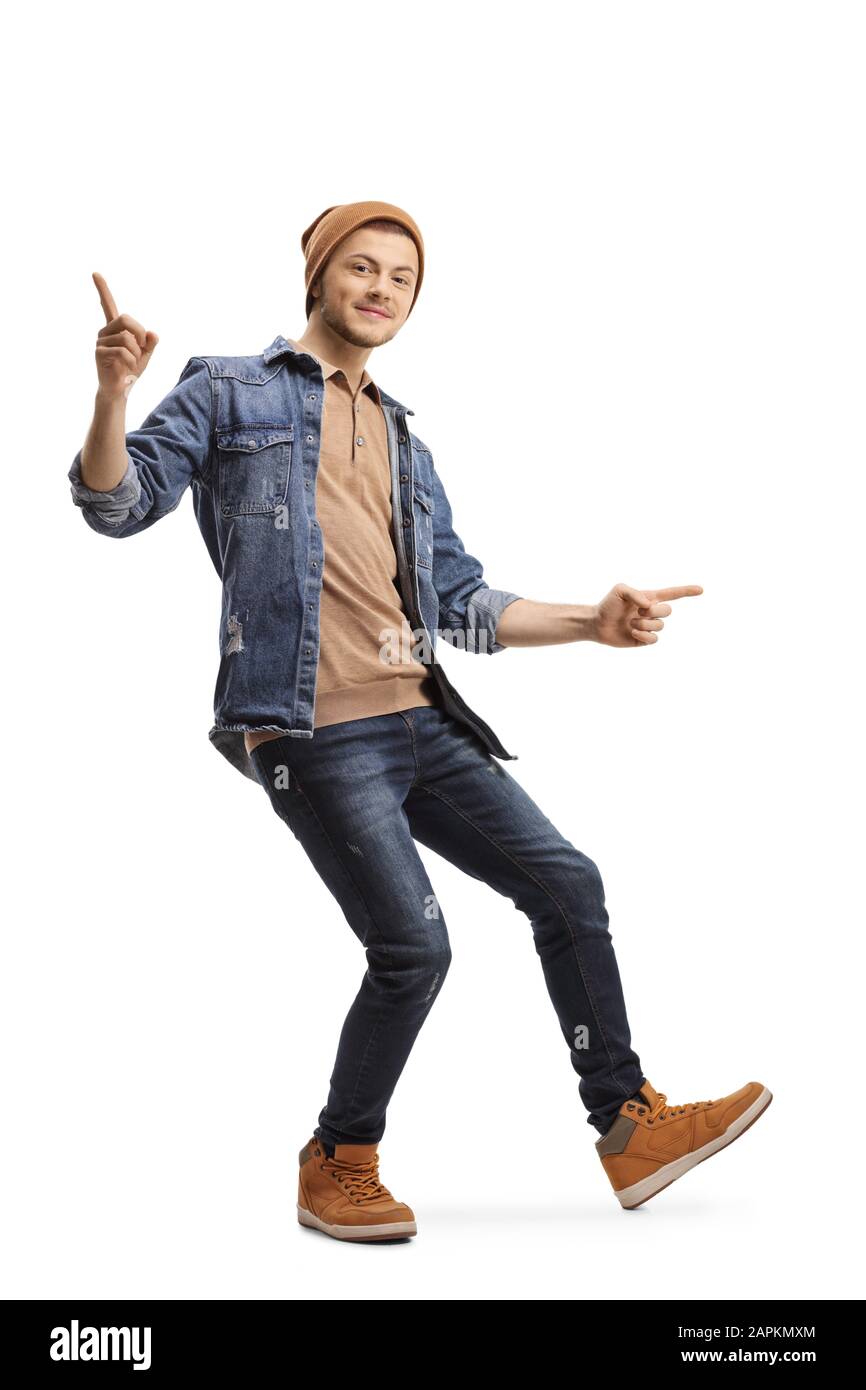 Tir sur toute la longueur d'un jeune gars joyeux faisant un mouvement de danse isolé sur fond blanc Banque D'Images