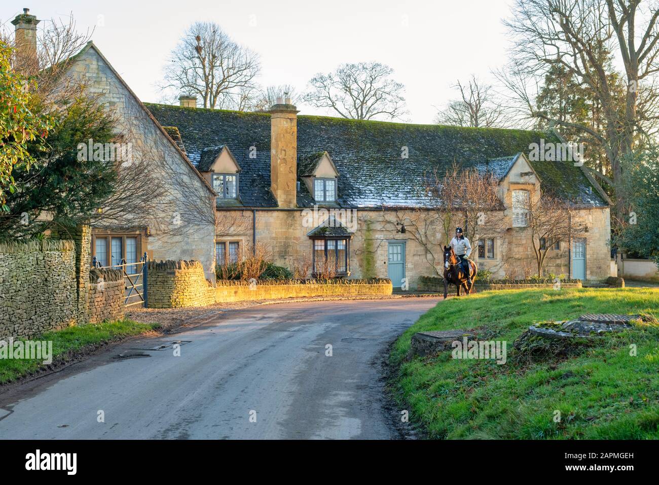 Stanton court cotswold des cottages en pierre en hiver au coucher du soleil. Stanton, Gloucestershire, Angleterre Banque D'Images