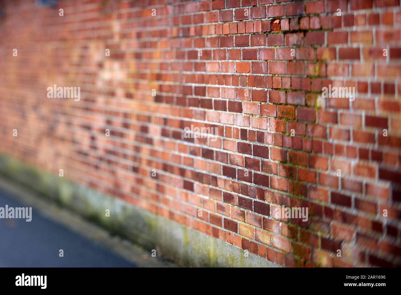 faible profondeur de champ sur le vieux mur victorien en brique rouge au royaume-uni Banque D'Images