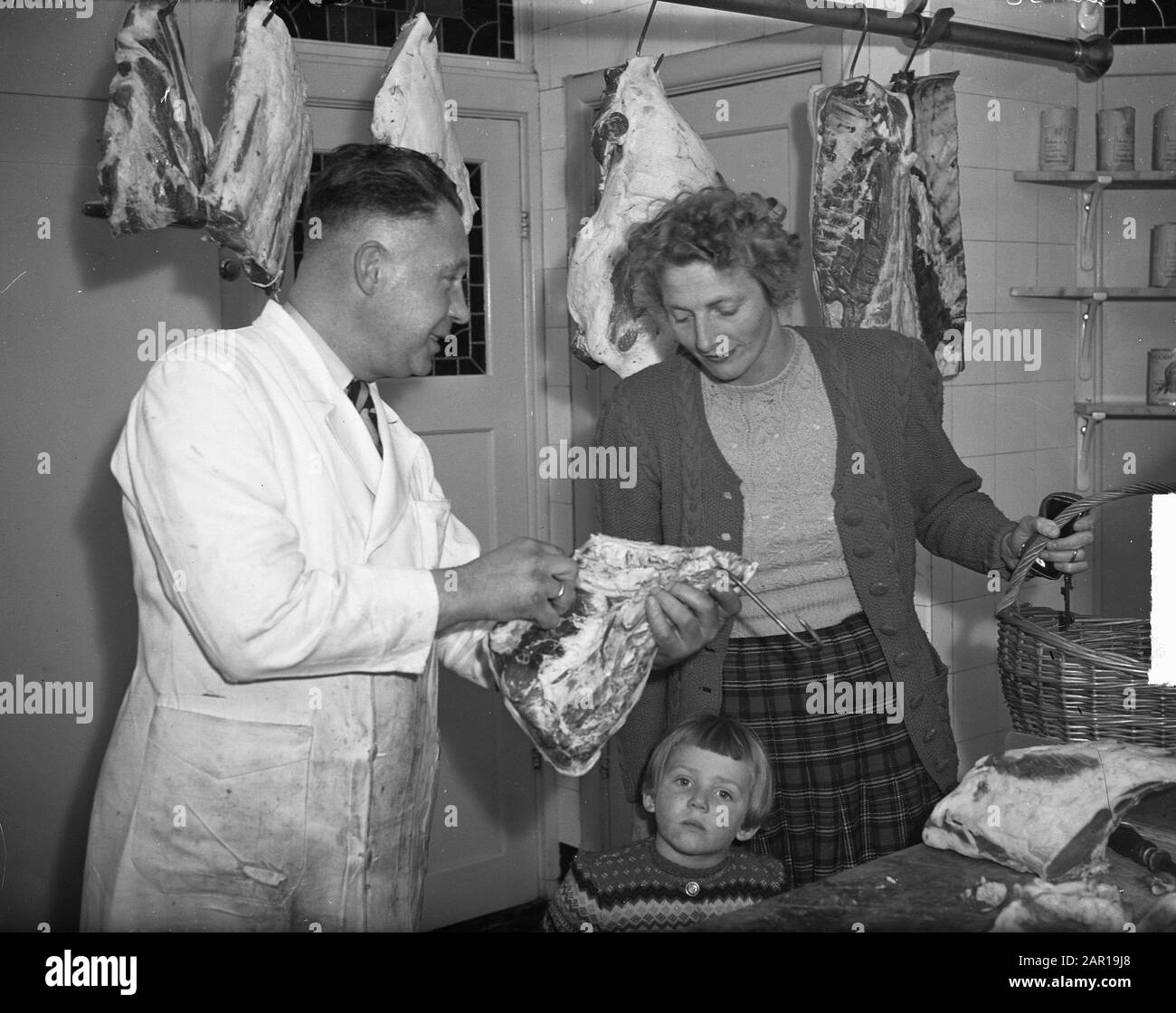 Fanny Blankers-Koen à l'Amérique (au boucher) Date: 14 mai 1949 lieu: Amsterdam, Noord-Holland mots clés: Athlètes, bouchers Nom personnel: Blankers-Koen, Fanny Banque D'Images