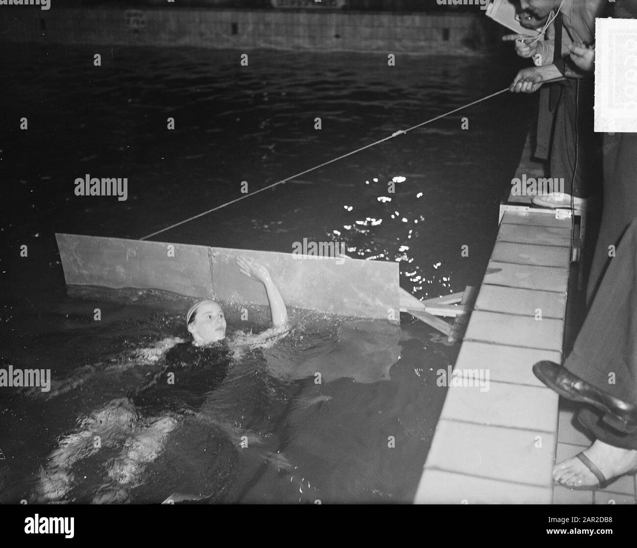 Geertje Wielema fait un nouveau record 100 yards Date: 14 mars 1950 mots clés: Record Nom personnel: Geertje Wielema Banque D'Images