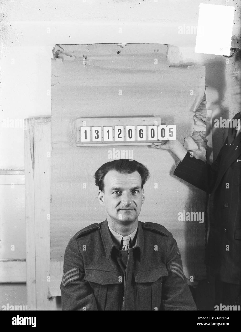 Passeport photo d'une armée sérante numéro 131206005 Annotation: Date de naissance de l'homme est 13-12-1906 Date: 3 mai 1950 mots clés: Militaire, portraits Banque D'Images