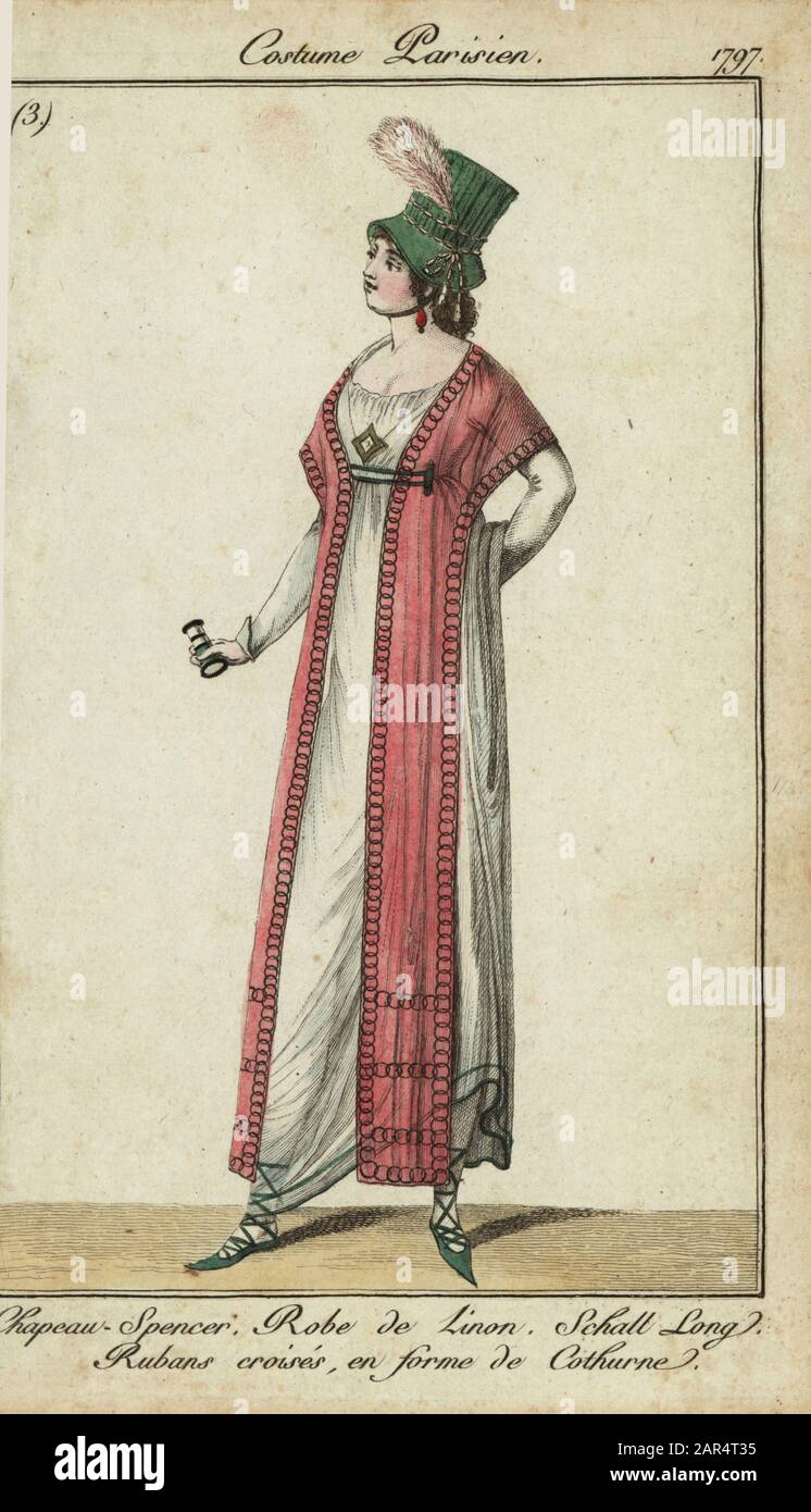 Femme dans les modes du répertoire, 1797. Elle porte un chapeau Spencer,  une robe de lin, un châle long et des chaussures sous la forme de Cothurne  (sandales lacées grecques classiques). Chapeau