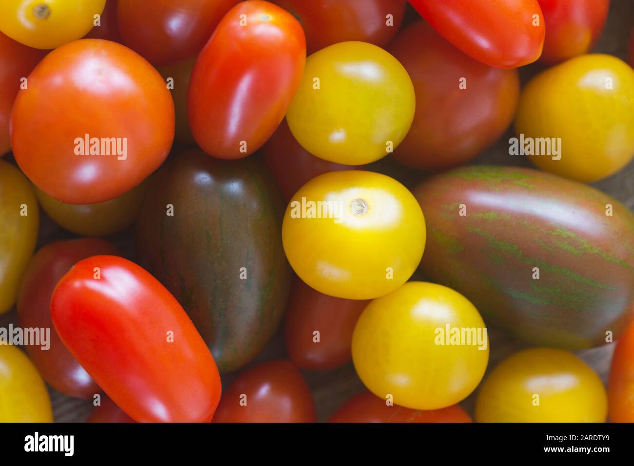 La fermeture des tomates cerises. Contexte alimentaire, orientation horizontale. Banque D'Images