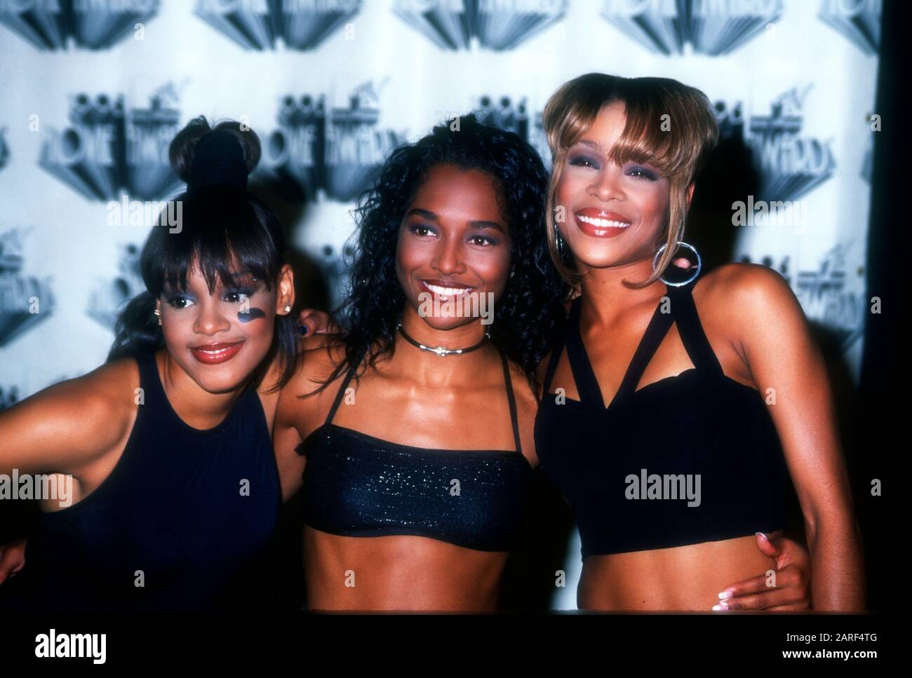 Burbank, Californie, États-Unis 10 juin 1995 (L-R) Singers Lisa 'Left Eye' Lopes, Rozonda 'Chili' Thomas et Tionne 'T-Bonz' Watkins of TLC assistent aux quatrième prix annuels du film MTV le 10 juin 1995 aux studios Warner Bros de Burbank, Californie, États-Unis. Photo De Barry King/Alay Stock Photo Banque D'Images