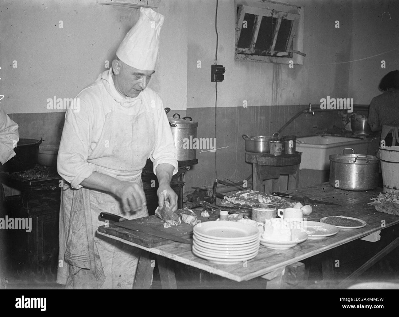Six Jours À Anvers. Le cuisinier au travail Date: 14 février 1947 lieu: Anvers mots clés: Cuisiniers, sports, cyclisme, six jours Banque D'Images