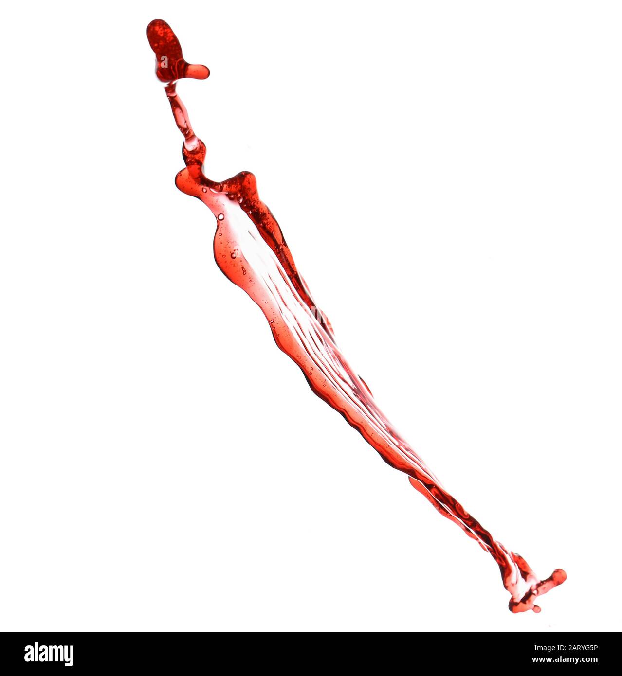 Vin rouge éclaboussant sur fond blanc Banque D'Images