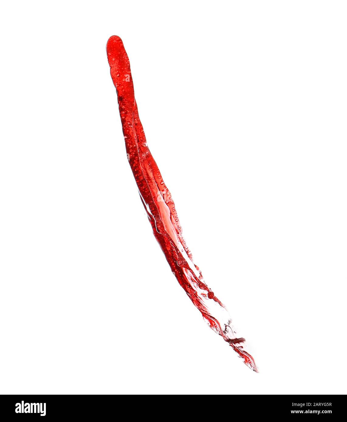 Vin rouge éclaboussant sur fond blanc Banque D'Images