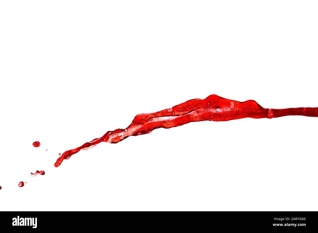 Vin rouge éclaboussant sur fond blanc Banque D'Images