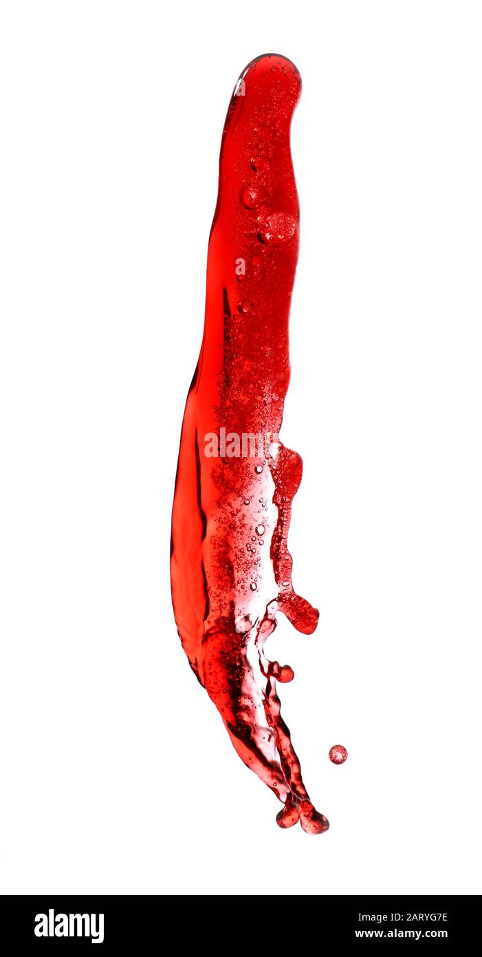 Vin rouge éclaboussant sur fond blanc Banque D'Images